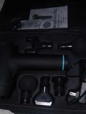 Homedics Black Massage Gun with Teal Accent and Multiple Heads